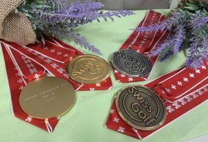 Gravure sur métal de médailles sportives